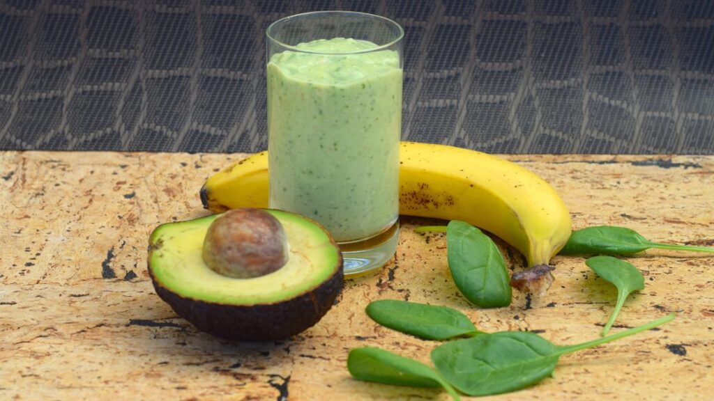 Smoothie made with banana, spinach, avocado