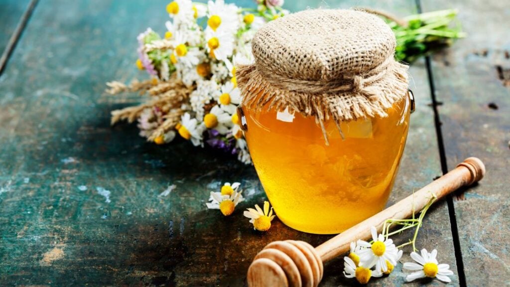 Decorated honey pot
